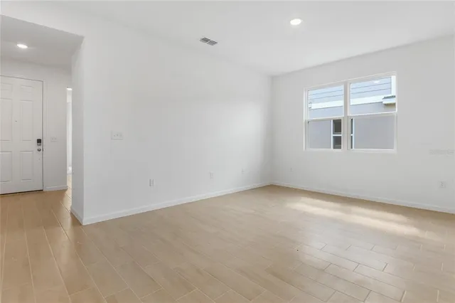 an empty room with a window