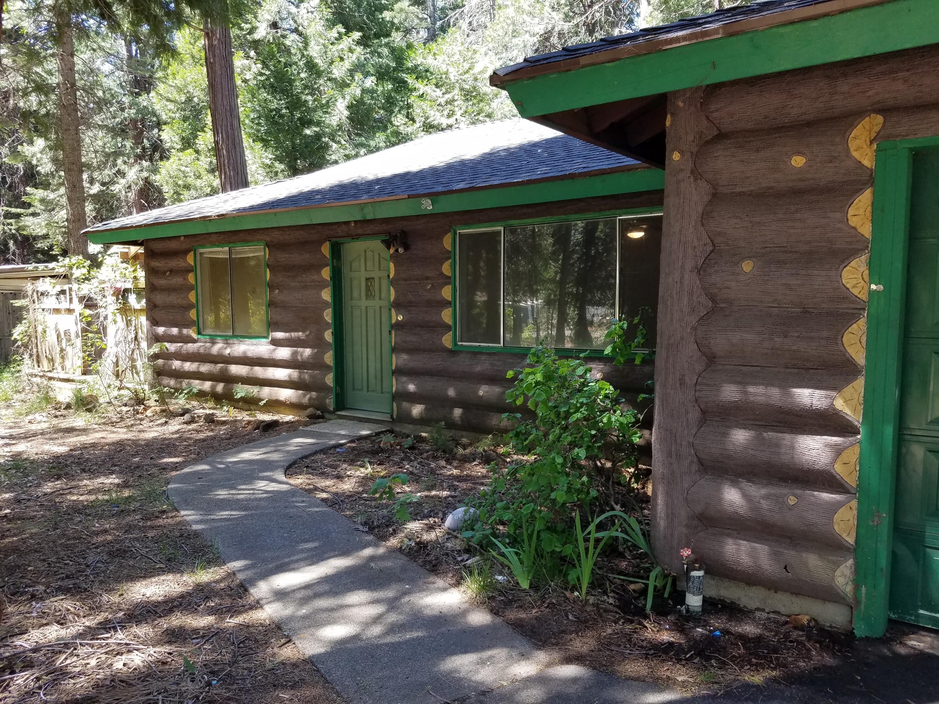 8118 Starlite Pines Road Shingletown, CA 96088 - Photo 3 of 32 STUCCO LOG SIDING