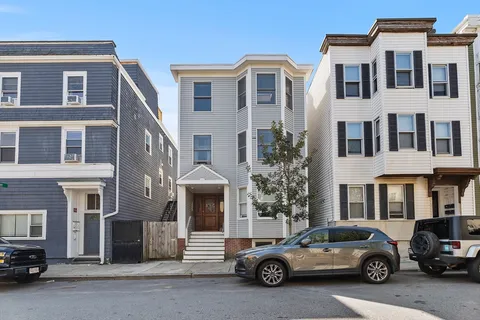 a car parked in front of a building