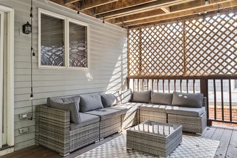 a couch sitting in front of a window