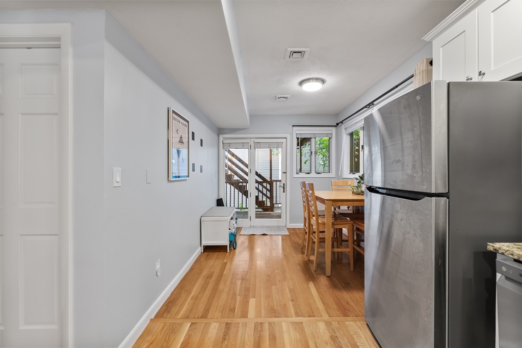 843 East 2nd Street, Unit 2 Boston, MA 02127 - Photo 4 of 12 a dining room with furniture and wooden floor