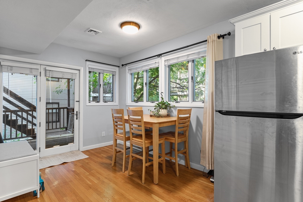 843 East 2nd Street, Unit 2 Boston, MA 02127 - Photo 5 of 12 a view of a dining room with furniture window and outside view