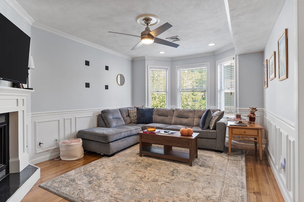 843 East 2nd Street, Unit 2 Boston, MA 02127 - Photo 7 of 12 a living room with furniture and a flat screen tv