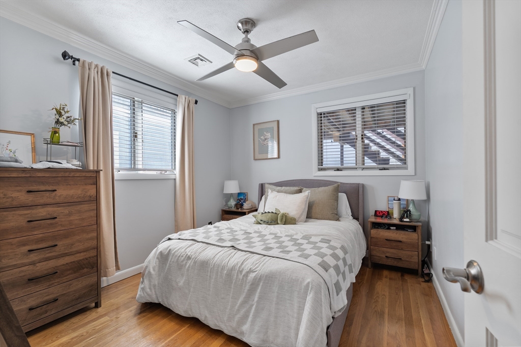 843 East 2nd Street, Unit 2 Boston, MA 02127 - Photo 9 of 12 a bedroom with a bed and a dresser