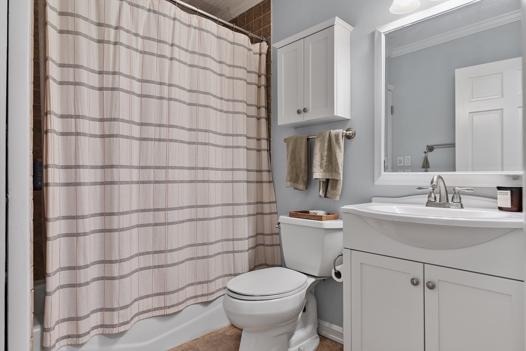 843 East 2nd Street, Unit 2 Boston, MA 02127 - Photo 10 of 12 a bathroom with a sink toilet and shower