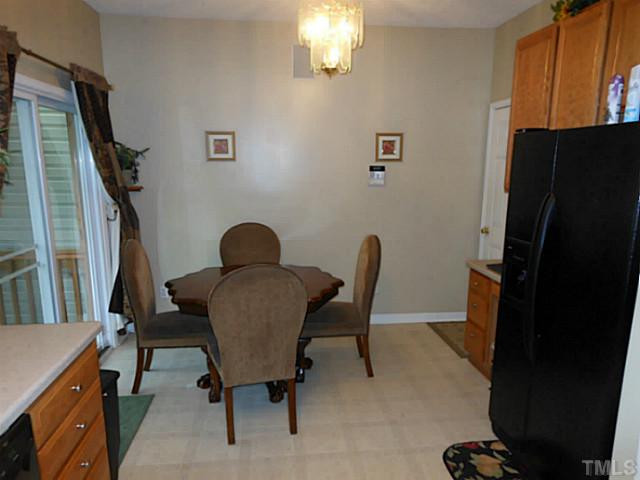 1 Edgebrook Circle Durham, NC 27703 - Photo 7 of 24 a workspace with furniture and a window