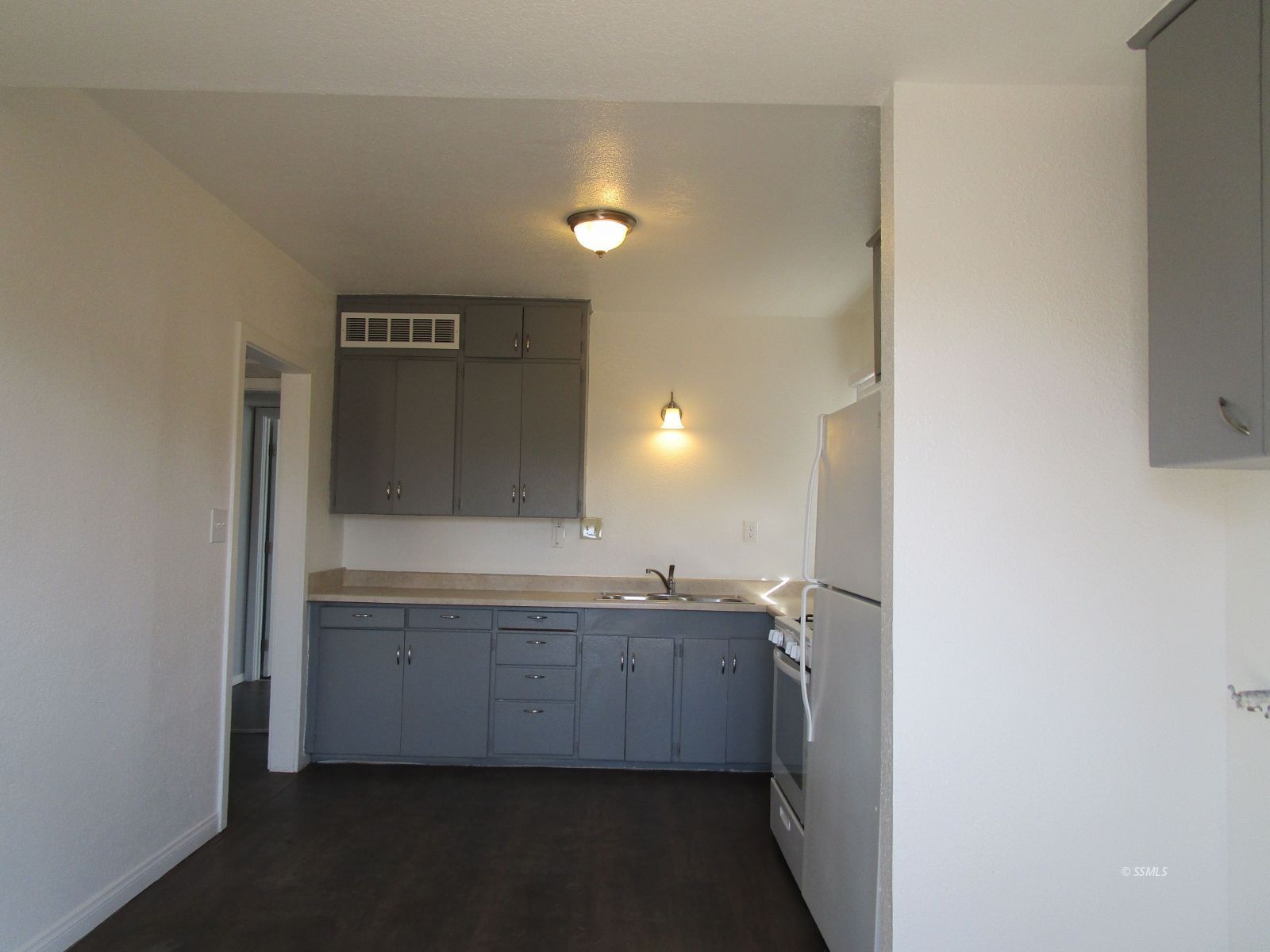 429 South Richmond Road Ridgecrest, CA 93555 - Photo 6 of 10 a bathroom with a sink and a mirror