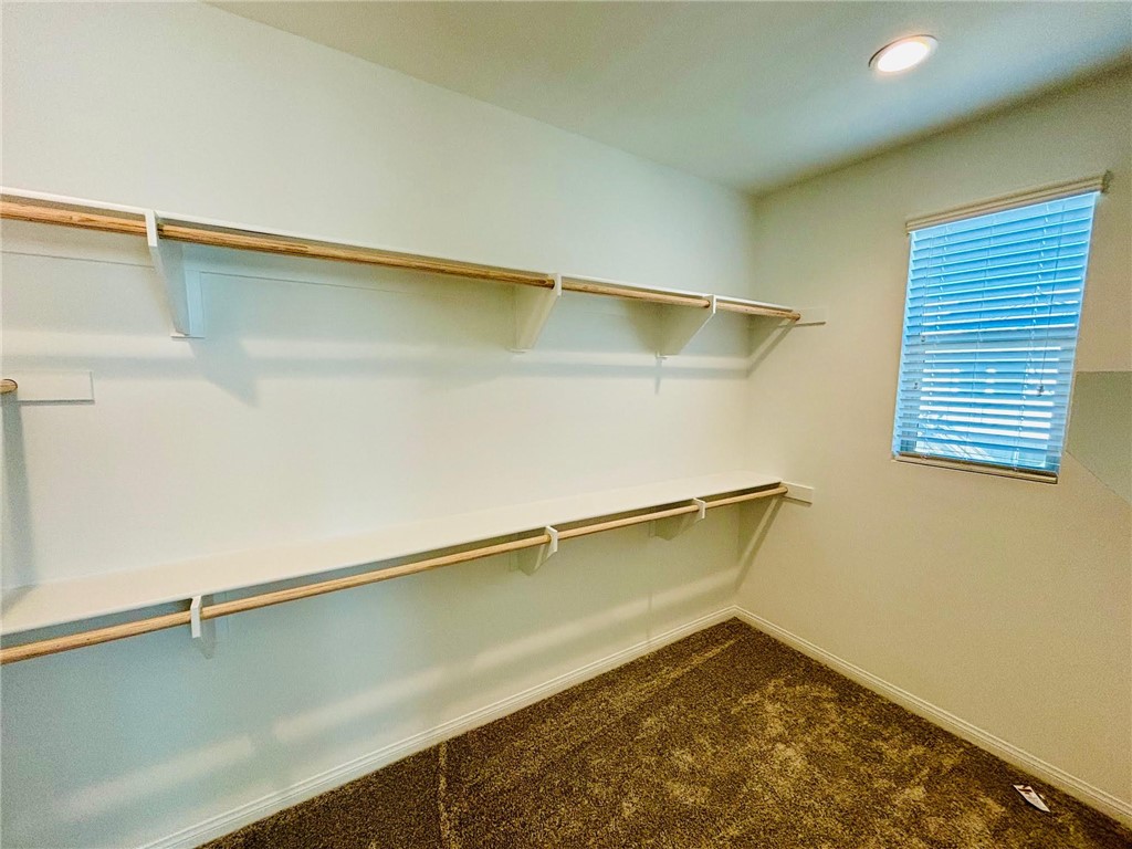 27366 Hyland Newhall, CA 91321 - Photo 16 of 31 a room with a walk in closet