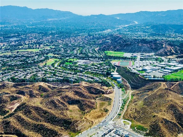 a view of a city and mountains