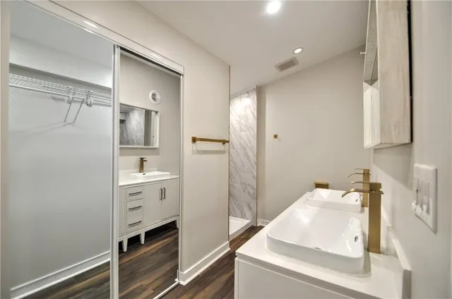 a bathroom with a bath tub