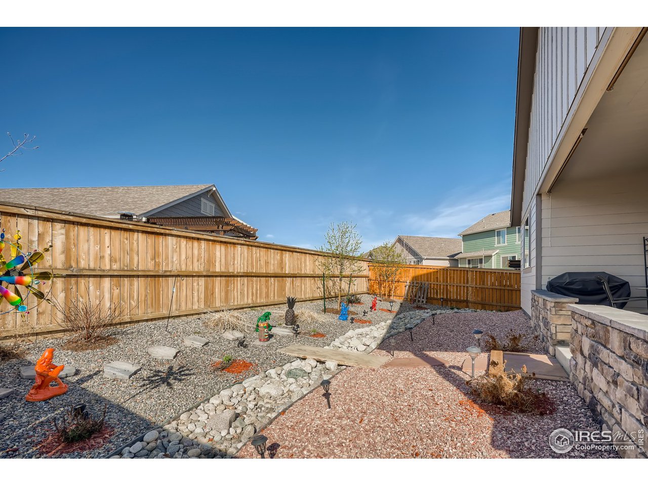 625 Ranchhand Drive Berthoud, CO 80513 - Photo 19 of 40 Backyard with professional xeriscape