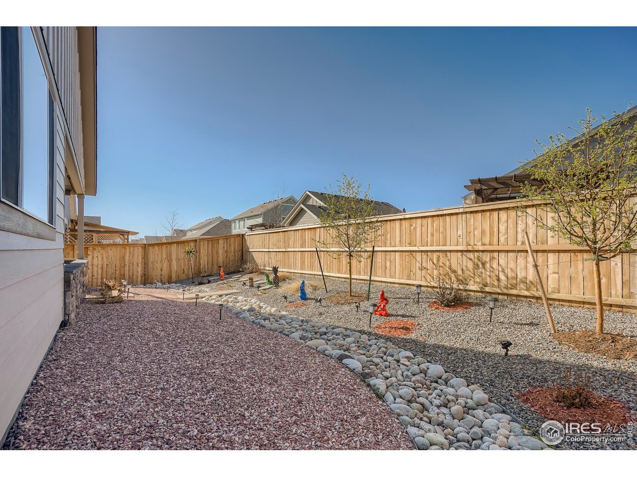 625 Ranchhand Drive Berthoud, CO 80513 - Photo 20 of 40 Backyard with professional xeriscape