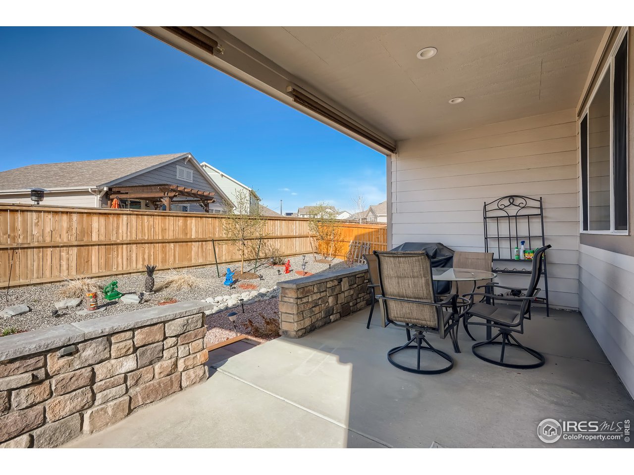 625 Ranchhand Drive Berthoud, CO 80513 - Photo 22 of 40 Big back covered patio