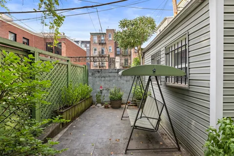 a house view with a garden space