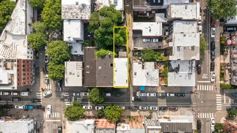 a view of city and a tall buildings