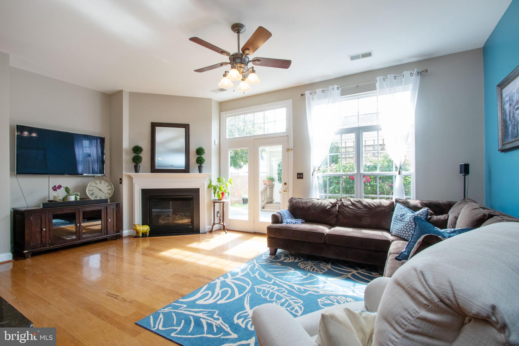 9036 Ribbon Falls Loop Bristow, VA 20136 - Photo 17 of 43 Spacious Family Room Opens to Custom Slate Patio