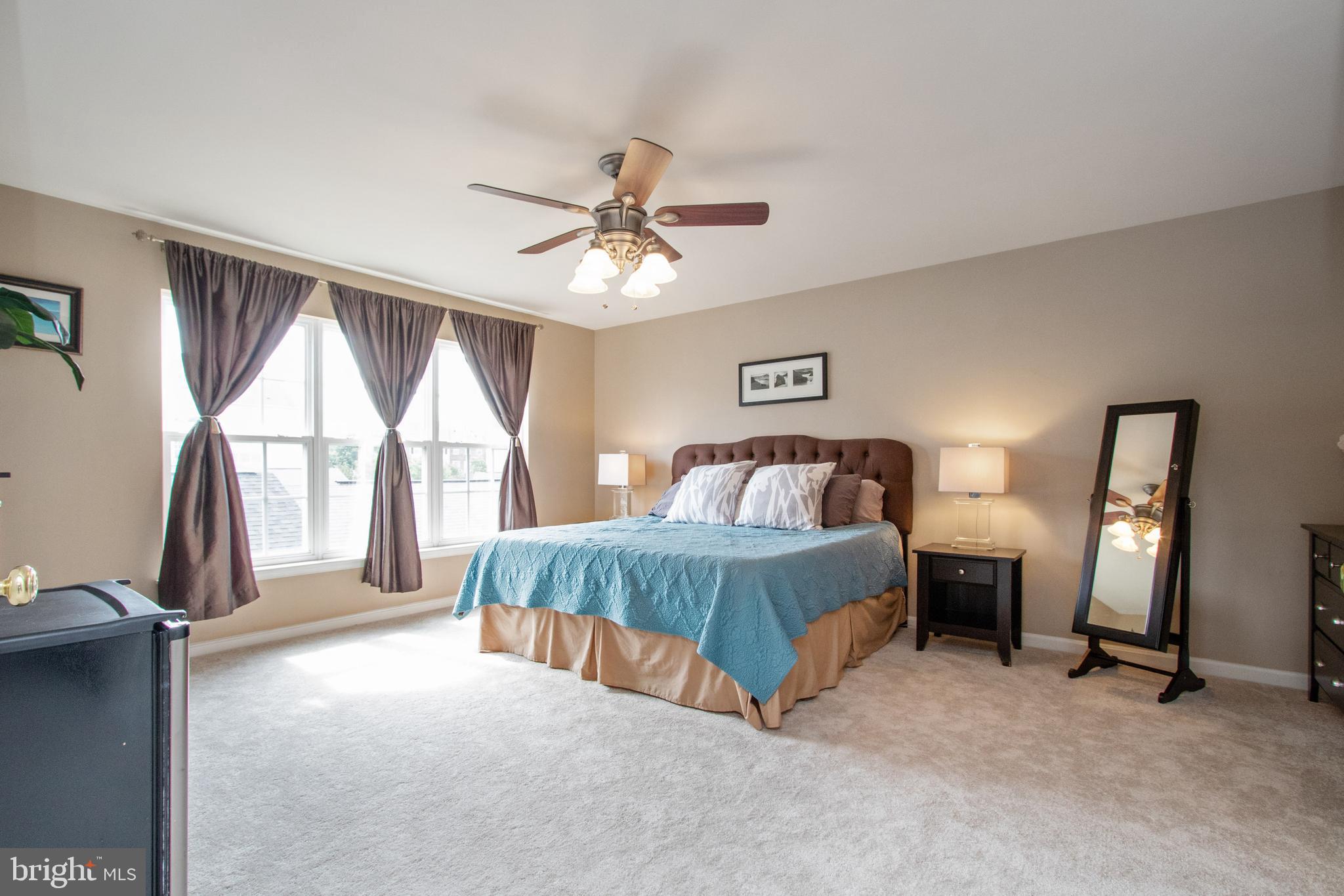 9036 Ribbon Falls Loop Bristow, VA 20136 - Photo 19 of 43 Master Bedroom Retreat with New Neutral Carpet
