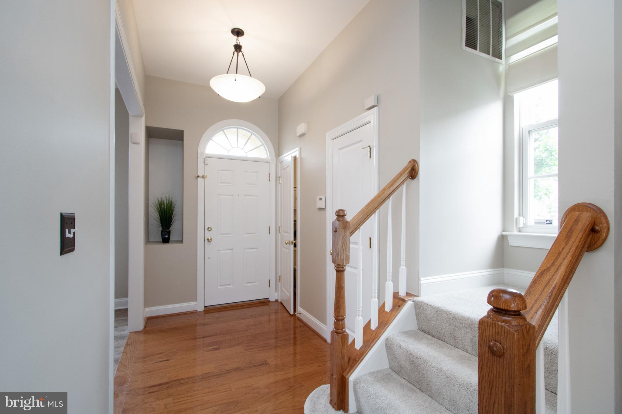9036 Ribbon Falls Loop Bristow, VA 20136 - Photo 5 of 43 Inviting Foyer--Soaring 10' Ceilings on Main Lvl