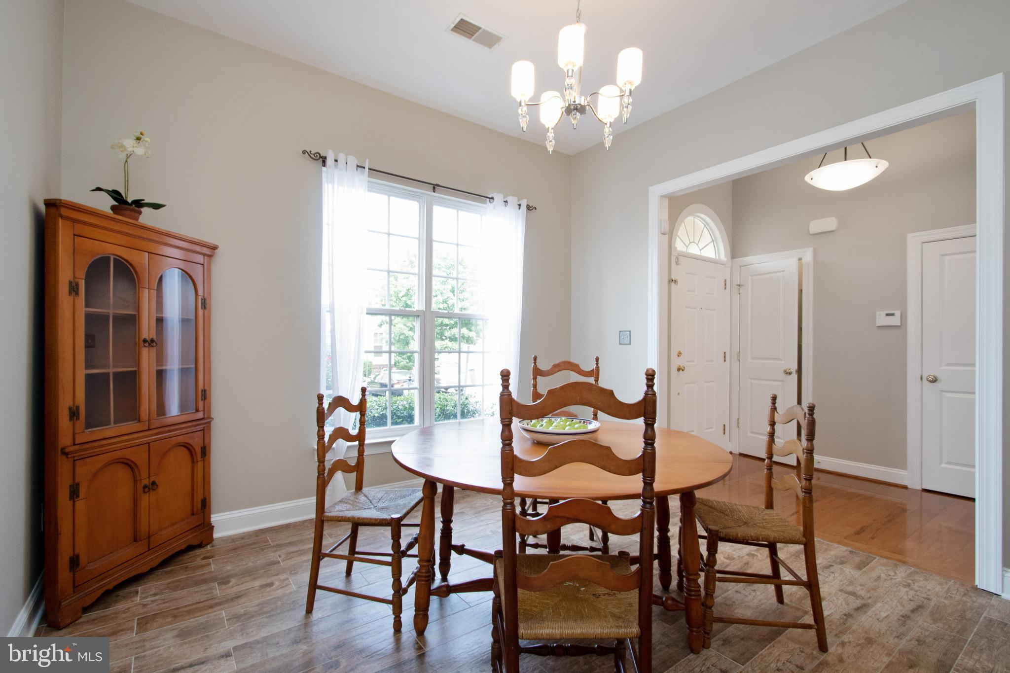 9036 Ribbon Falls Loop Bristow, VA 20136 - Photo 8 of 43 Dining Room Opens to Foyer