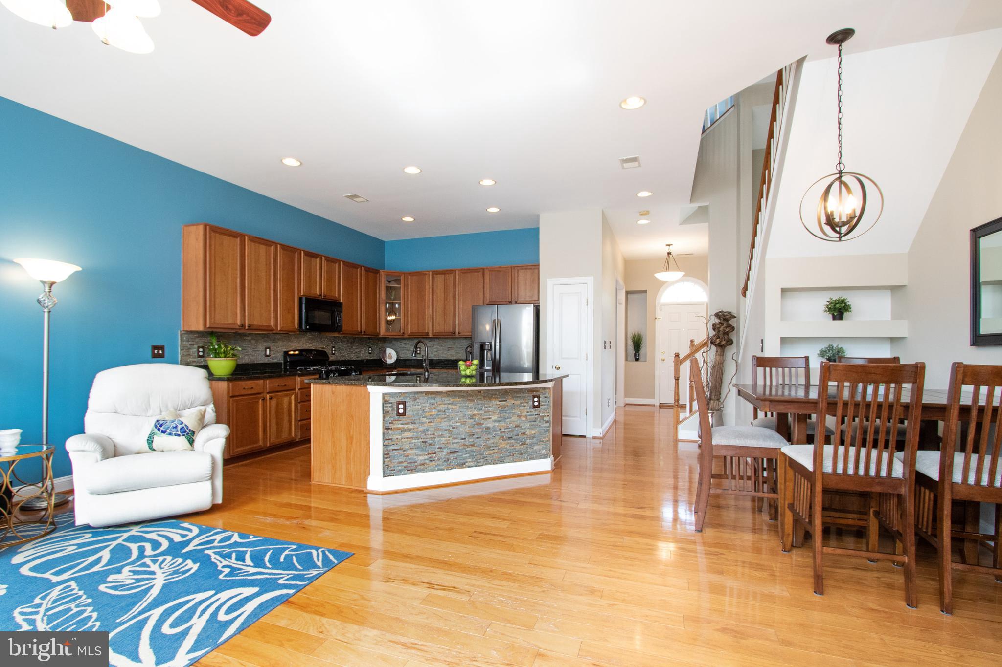9036 Ribbon Falls Loop Bristow, VA 20136 - Photo 10 of 43 Foyer Opens to Gourmet Kitchen & Family Room