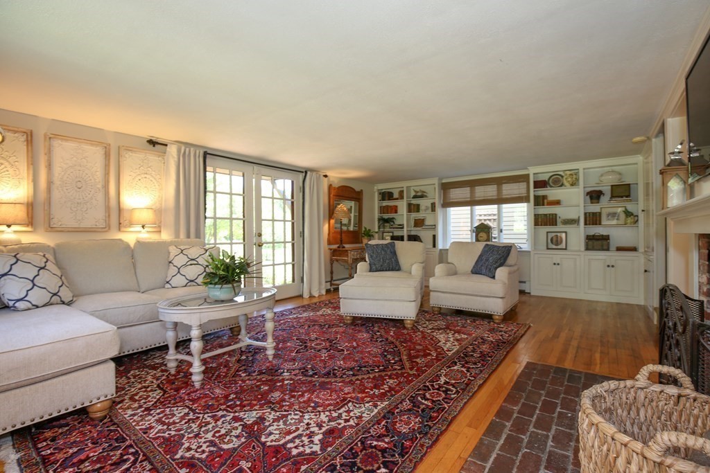 21 Rolfe's Lane Newbury, MA 01951 - Photo 12 of 42 a living room with furniture rug and window