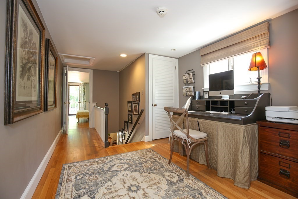 21 Rolfe's Lane Newbury, MA 01951 - Photo 15 of 42 a view of a livingroom with furniture and a flat screen tv
