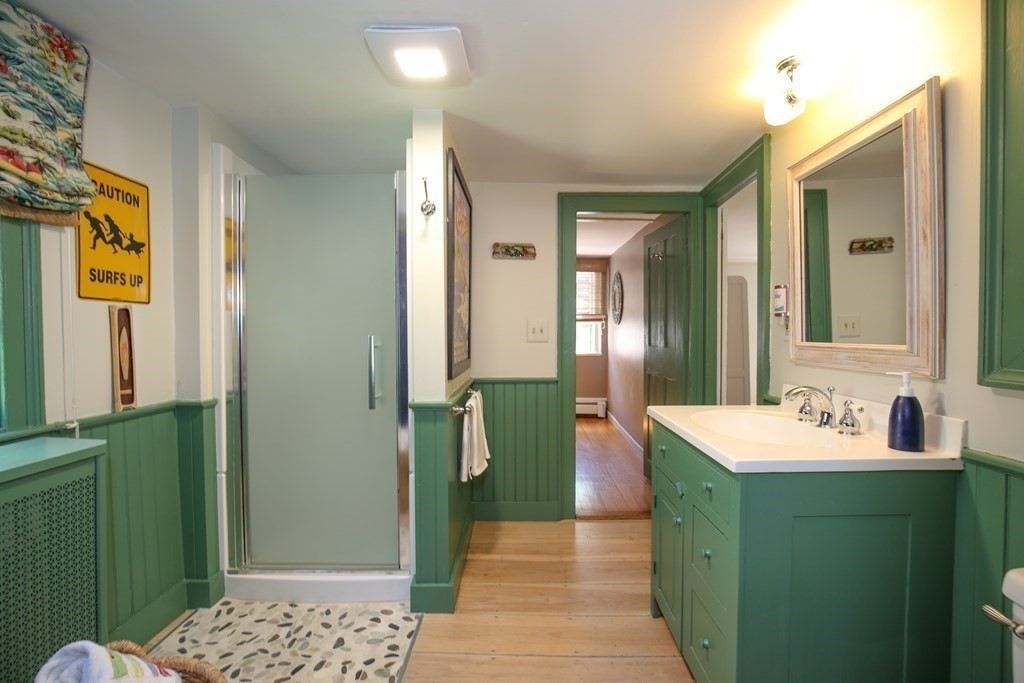 21 Rolfe's Lane Newbury, MA 01951 - Photo 16 of 42 a bathroom with a sink a toilet and shower