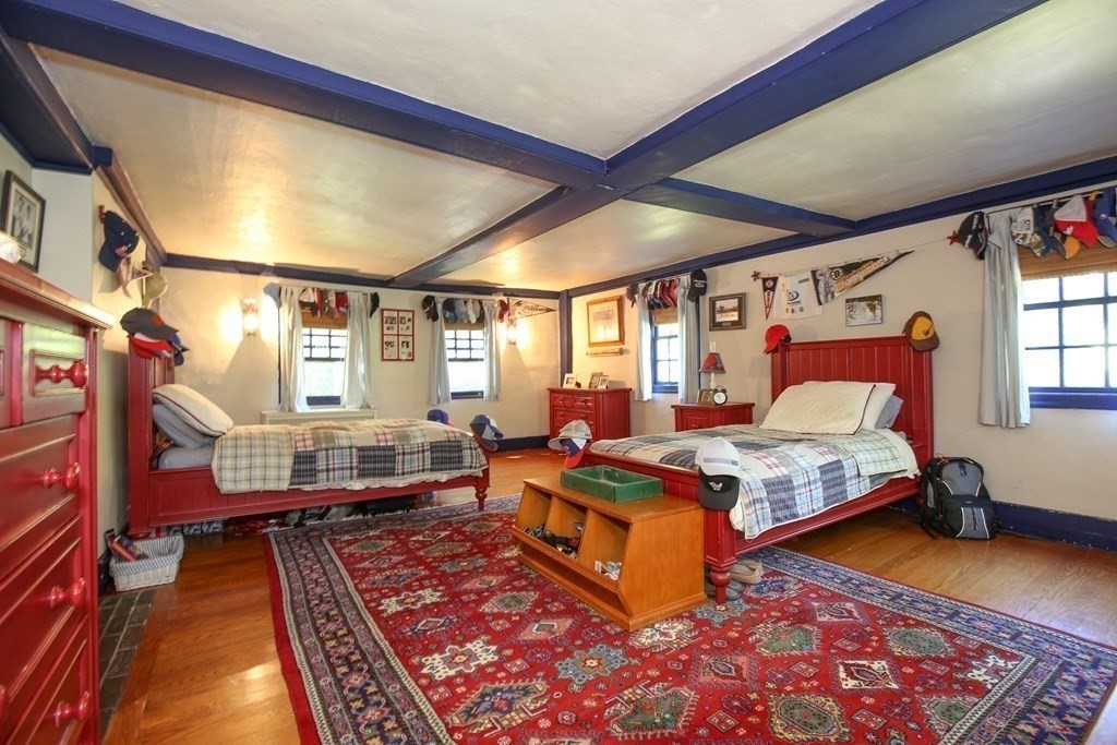 21 Rolfe's Lane Newbury, MA 01951 - Photo 19 of 42 a bedroom with furniture and a window