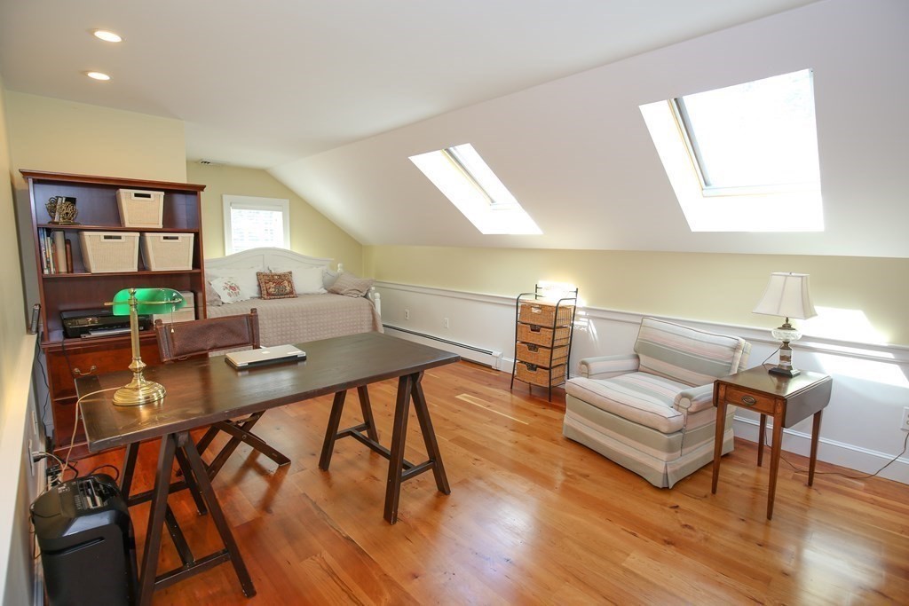21 Rolfe's Lane Newbury, MA 01951 - Photo 24 of 42 a living room with furniture and wooden floor