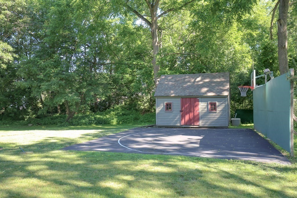 21 Rolfe's Lane Newbury, MA 01951 - Photo 35 of 42 a view of a backyard with a small cabin