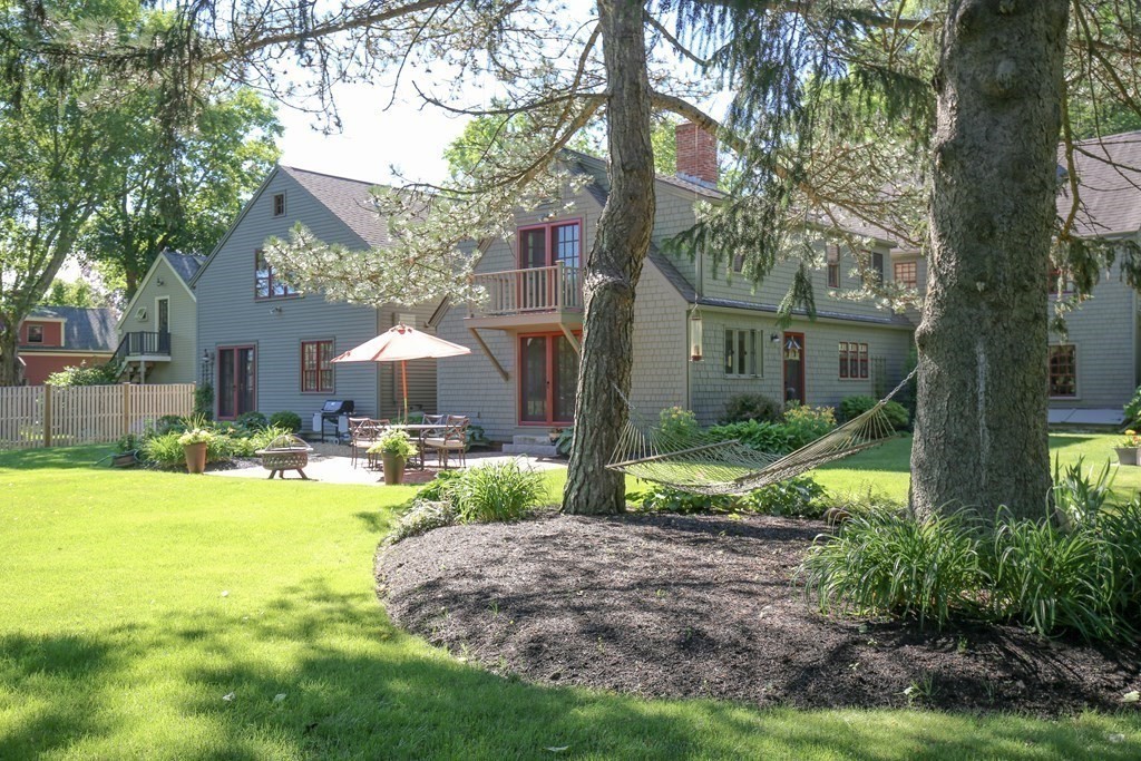 21 Rolfe's Lane Newbury, MA 01951 - Photo 38 of 42 a view of a house with backyard and sitting area