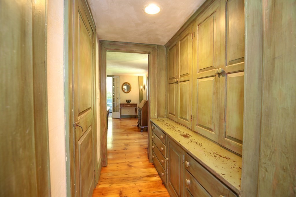 21 Rolfe's Lane Newbury, MA 01951 - Photo 9 of 42 a view of a hallway with wooden floor
