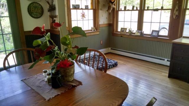 552 Durgintown Road Hiram, ME 04041 - Photo 3 of 24 Large sunlit dining room area.