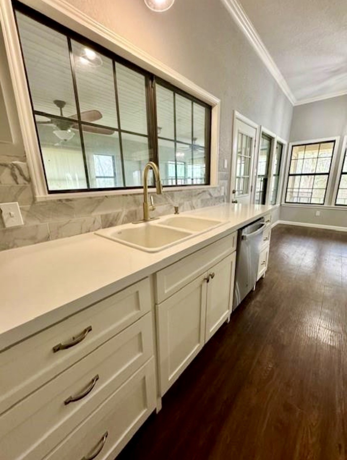 327 County Road 735 Angleton, TX 77515 - Photo 12 of 39 a view of a kitchen with a sink and large window
