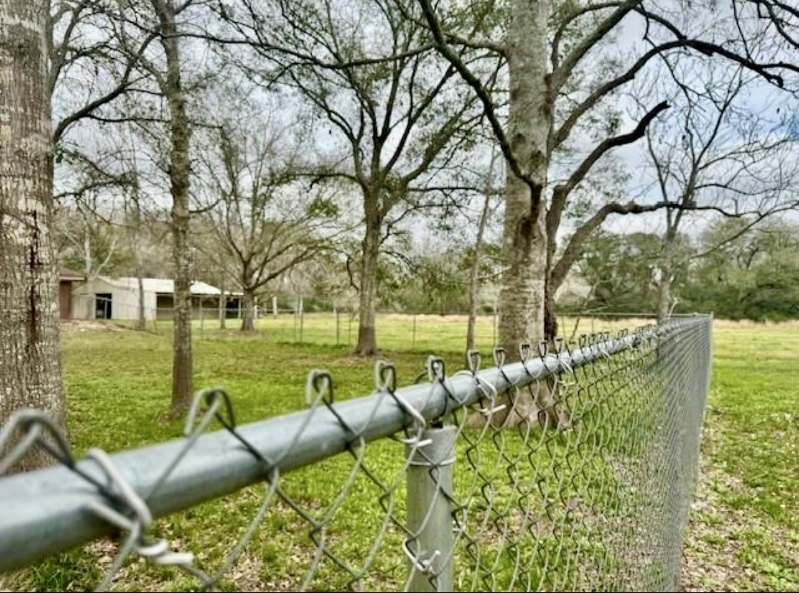 327 County Road 735 Angleton, TX 77515 - Photo 27 of 39 a view of backyard with swimming pool and patio