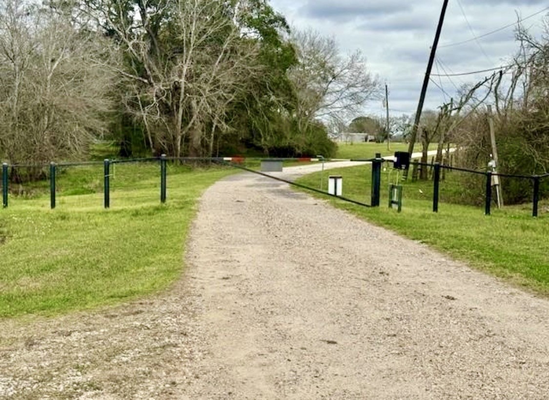327 County Road 735 Angleton, TX 77515 - Photo 35 of 39 a view of a park with swings