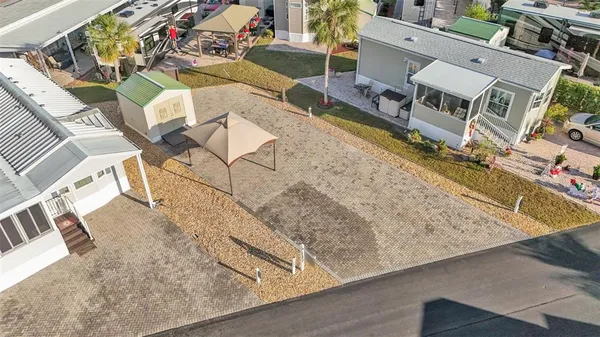 an aerial view of a house with swimming pool