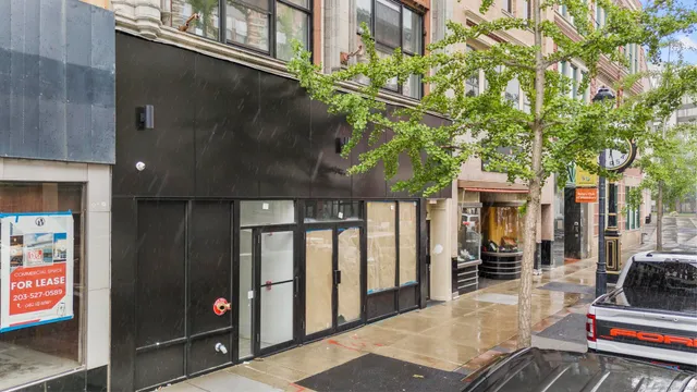 a patio with a table and chairs