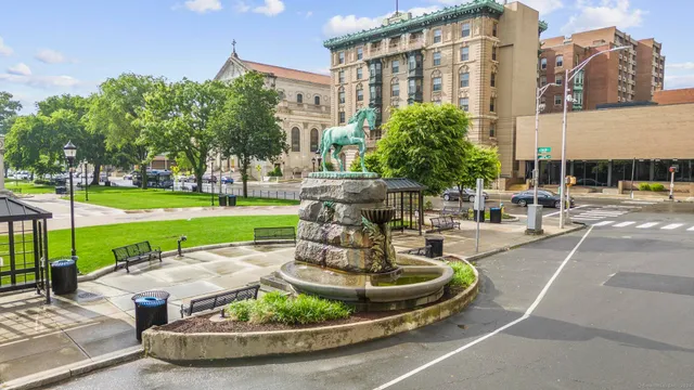 a front view of a building with glass windows