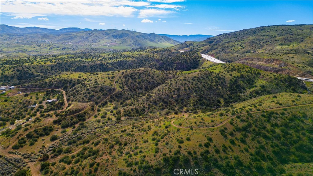 0 Courson Ranch Road Palmdale, CA 93550 - Photo 6 of 12 a view of a lush green hillside and houses