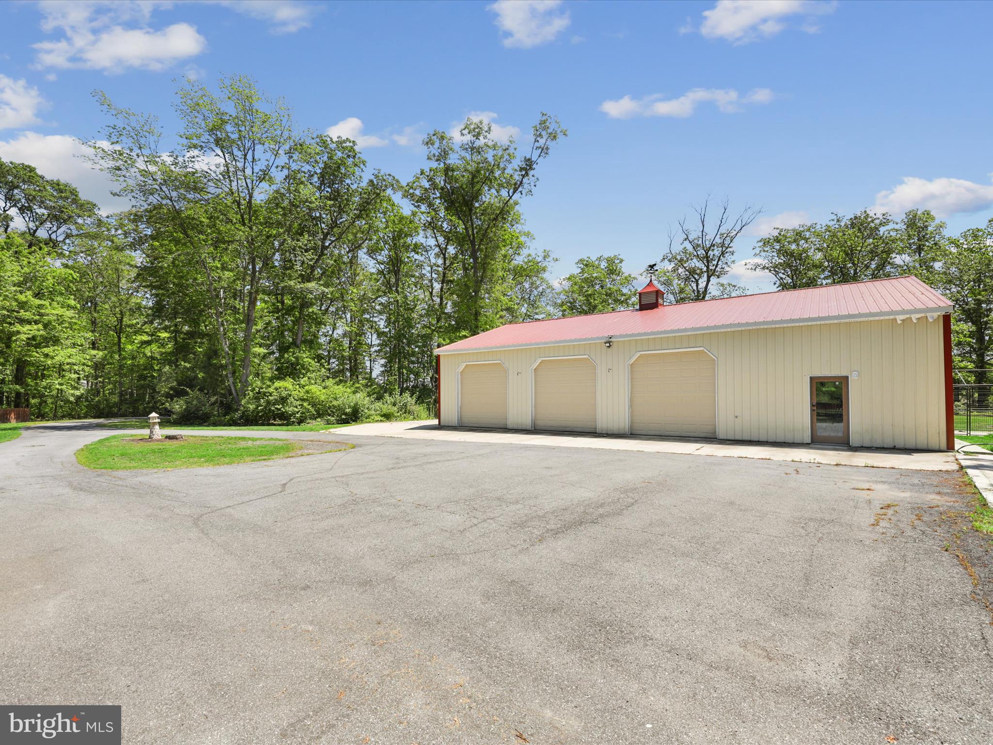 22034 Simpler Branch Road Georgetown, DE 19947 - Photo 45 of 56 Oversized 3-Car Garage and Workshop