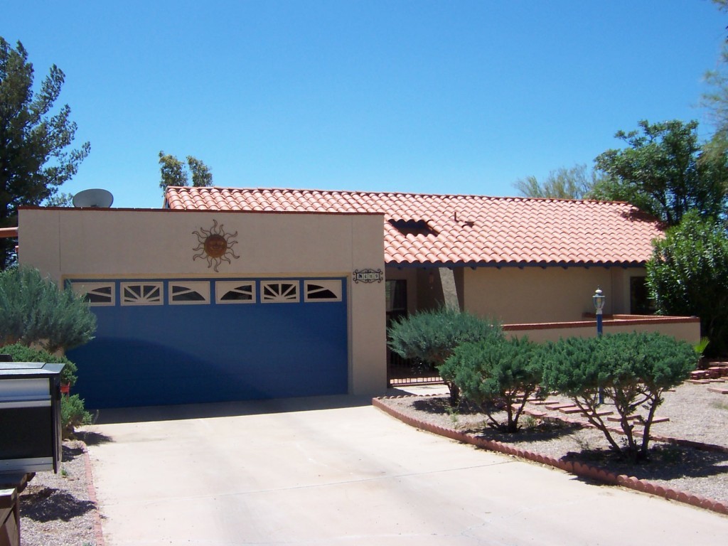 409 Curry Street Rio Rico, AZ 85648 - Photo 1 of 11 a view of a house with a patio