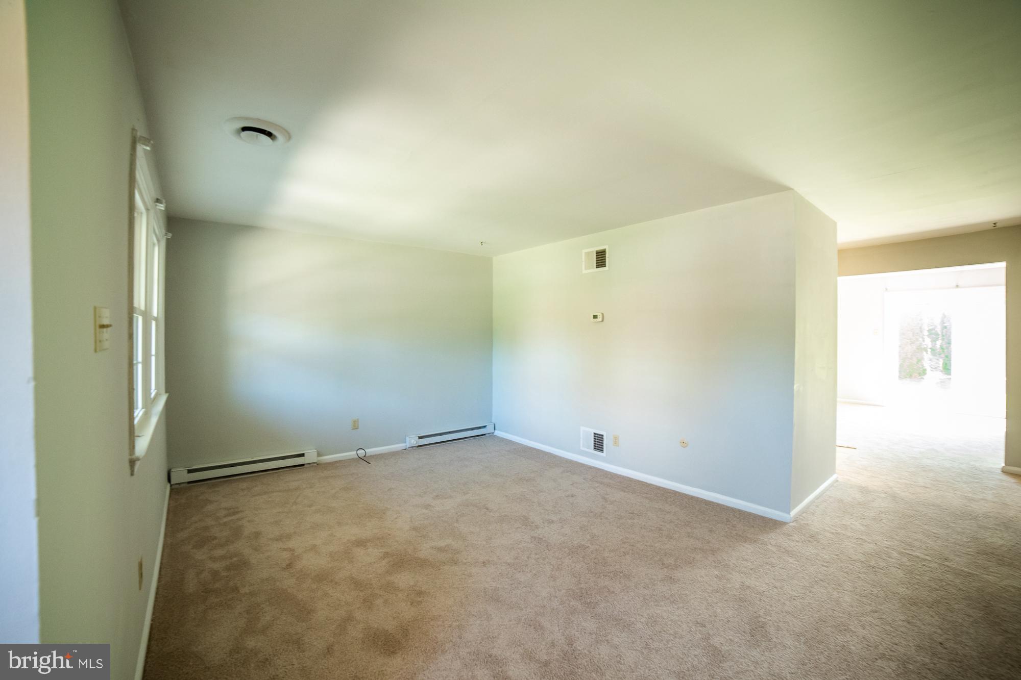 8 Stonegate Road Quakertown, PA 18951 - Photo 5 of 30 Living room to kitchen & family room