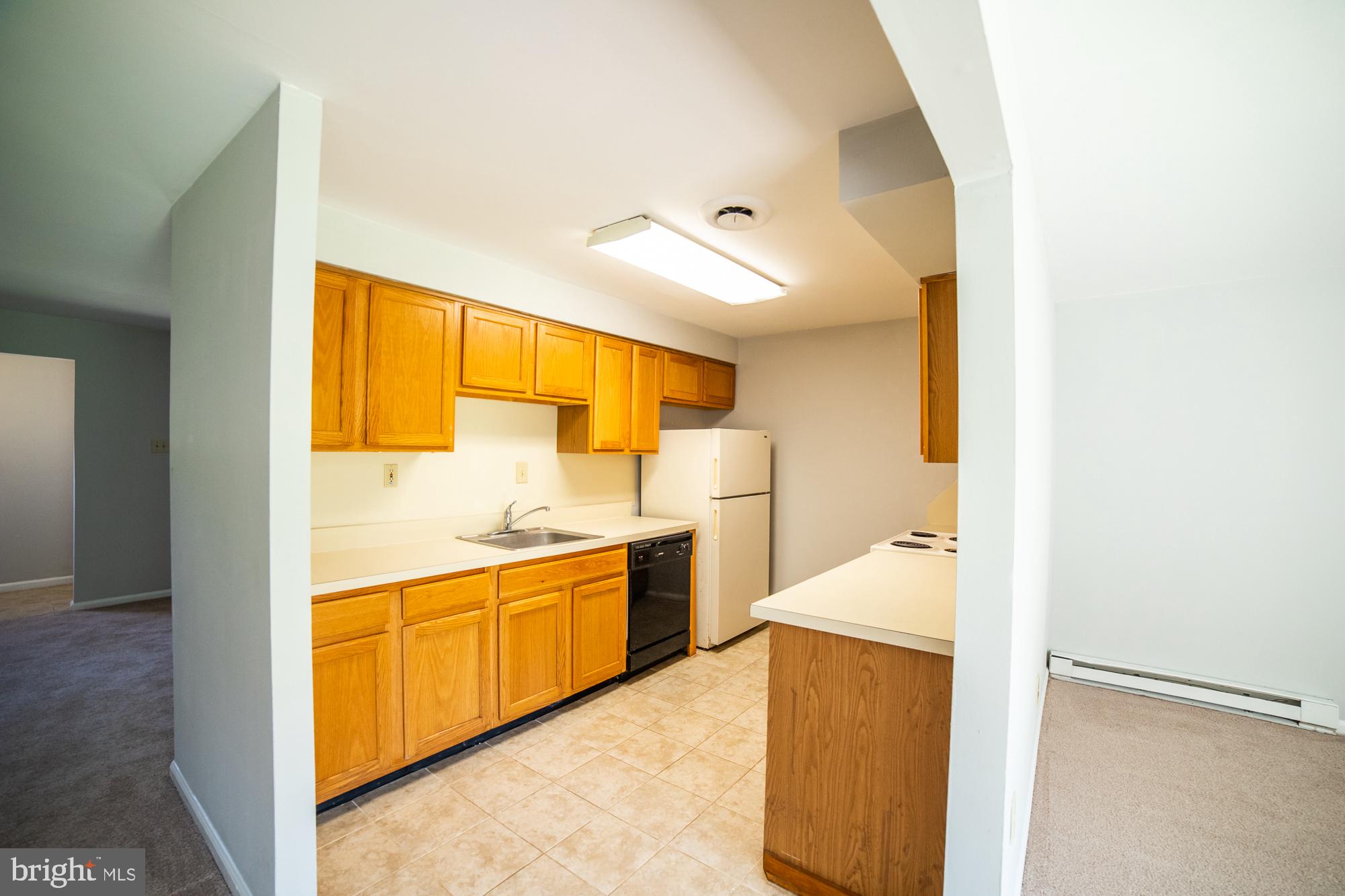 8 Stonegate Road Quakertown, PA 18951 - Photo 9 of 30 Kitchen to living room