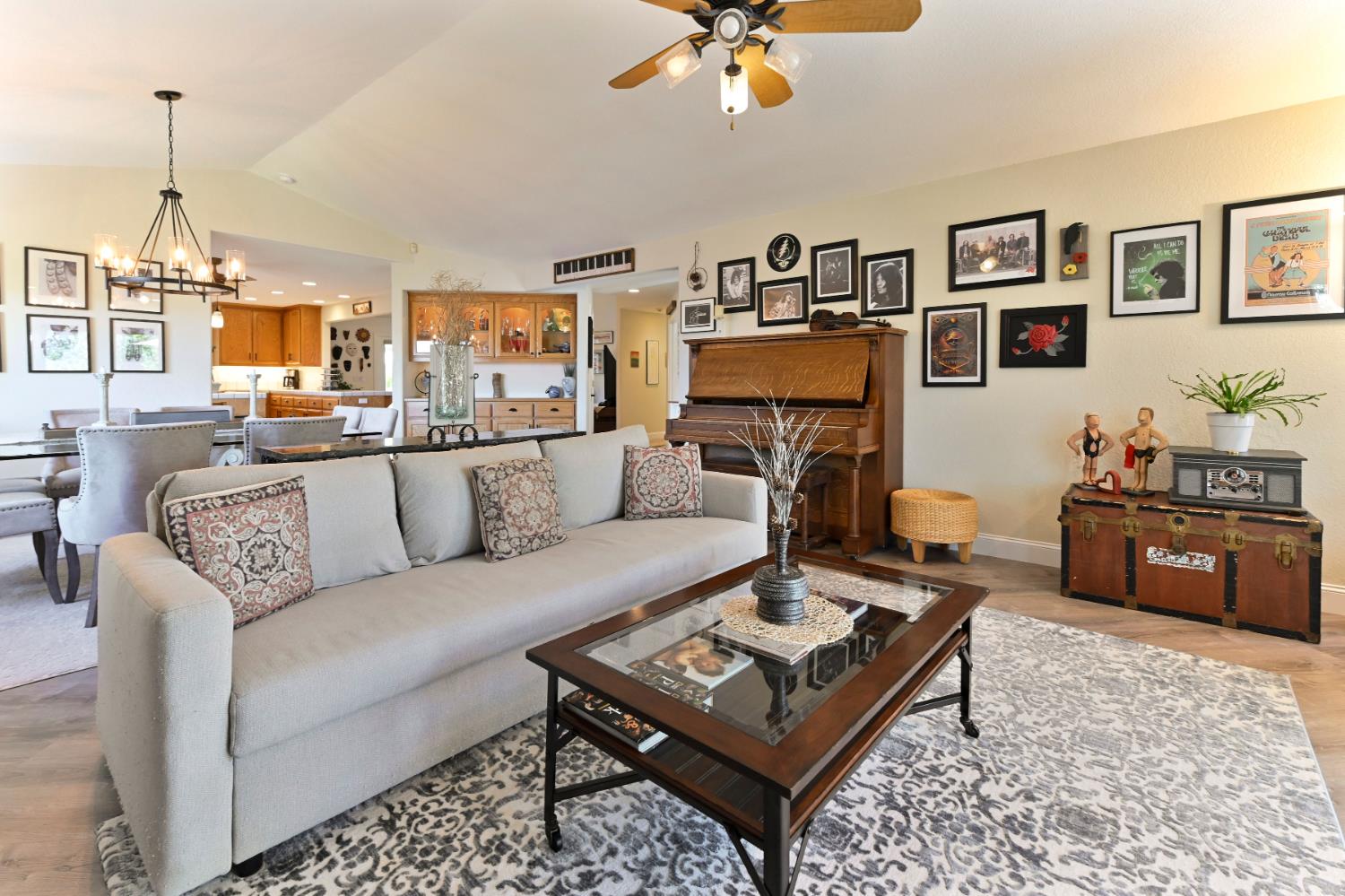 234 Mistletoe Court Angels Camp, CA 95222 - Photo 14 of 80 a living room with furniture a rug and a chandelier