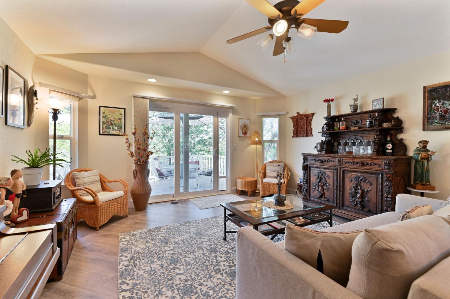 234 Mistletoe Court Angels Camp, CA 95222 - Photo 17 of 80 a living room with furniture a flat screen tv and a fireplace