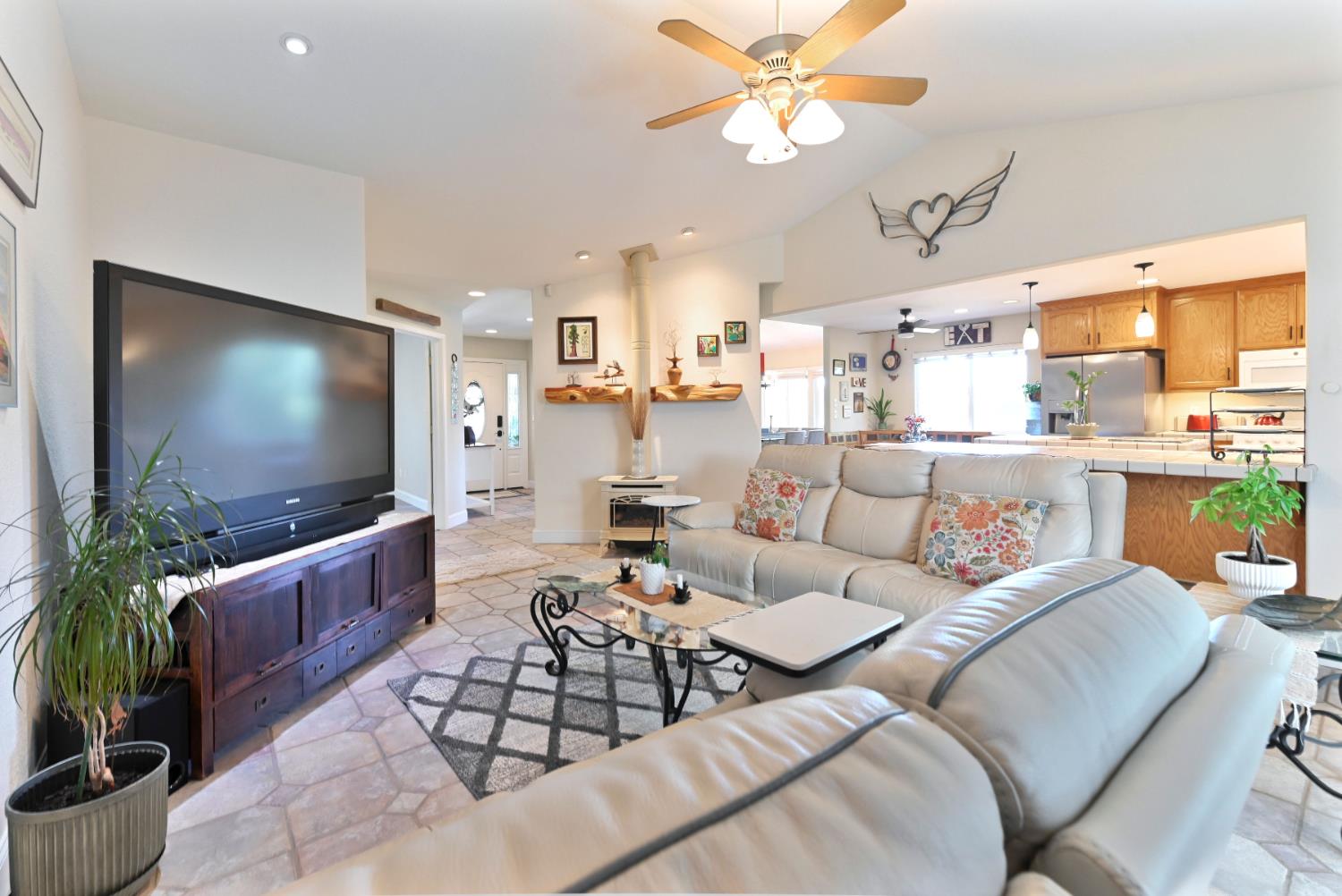 234 Mistletoe Court Angels Camp, CA 95222 - Photo 32 of 80 a living room with furniture and a flat screen tv