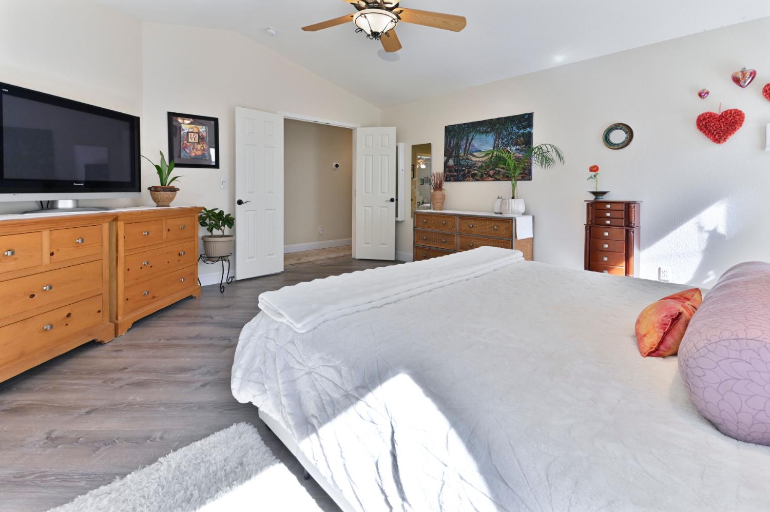 234 Mistletoe Court Angels Camp, CA 95222 - Photo 45 of 80 a bedroom with a bed and a flat screen tv