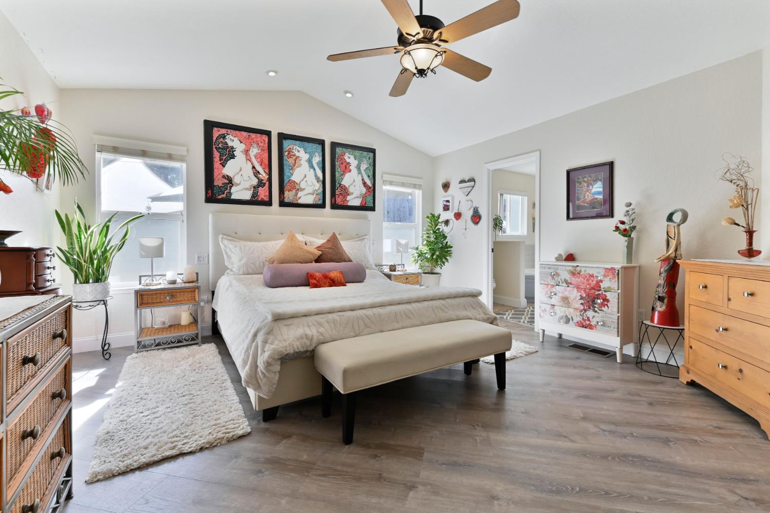 234 Mistletoe Court Angels Camp, CA 95222 - Photo 46 of 80 a bedroom with a bed and a chandelier