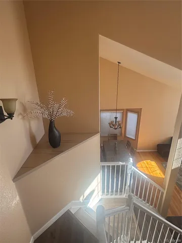 a view of balcony with furniture